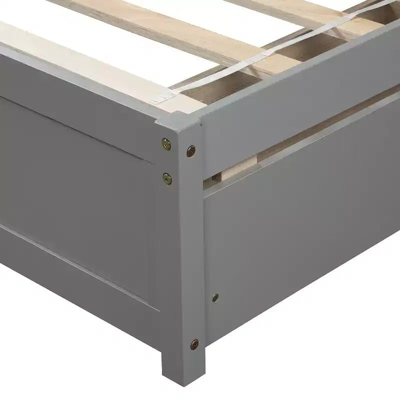 Lit plateforme de taille simple avec deux tiroirs et une tête de lit