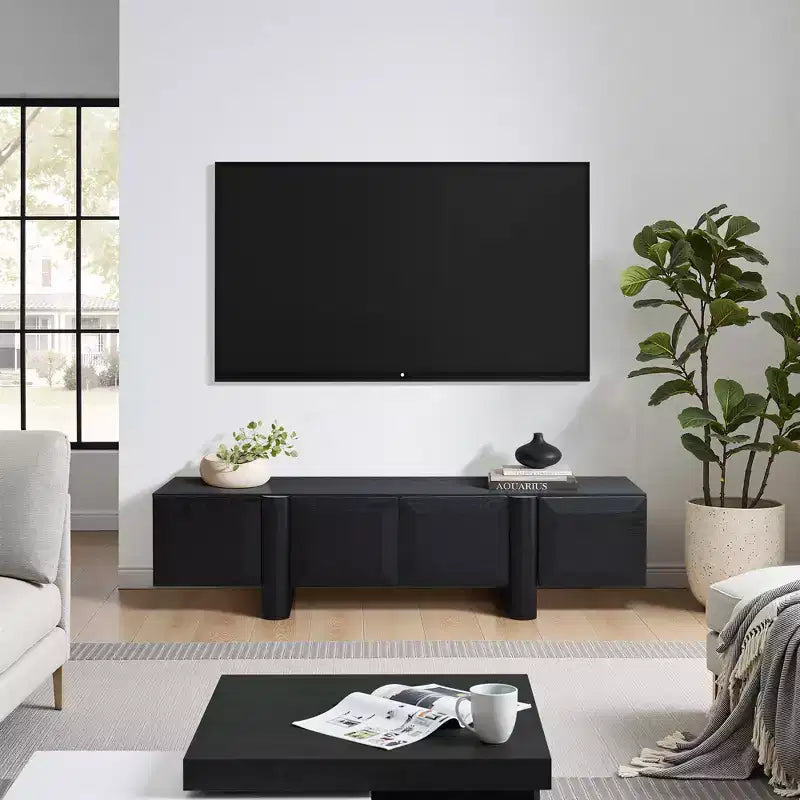 Meuble TV moderne noir de 63 pouces pour téléviseurs jusqu'à 68 pouces, profil bas avec 4 portes à ouverture par pression